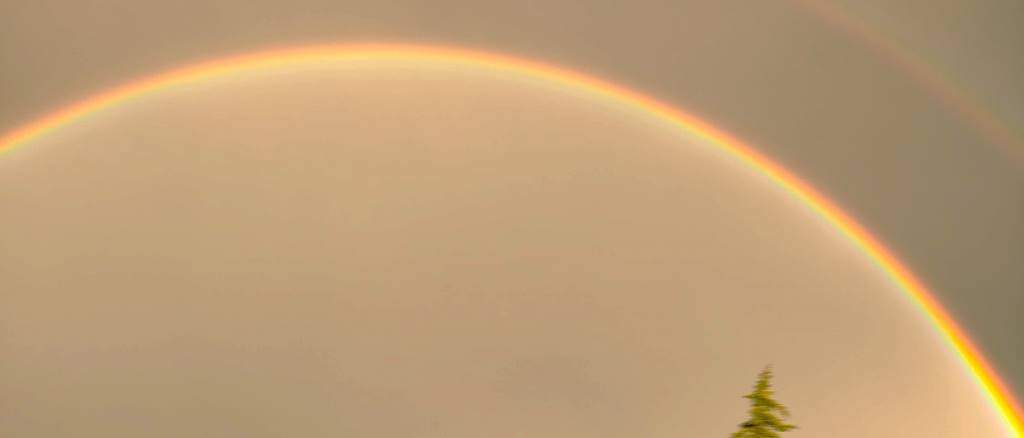 Rainbow in a dark sky