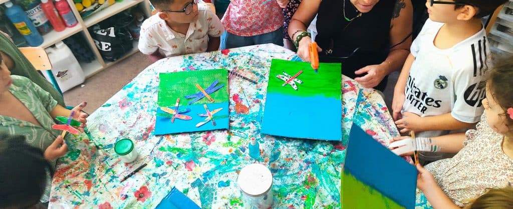 Making dragonflies out of packaging with kids